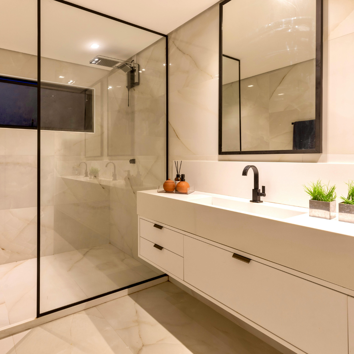 Standard Room bathroom with onyx marble walls and walk-in rain shower